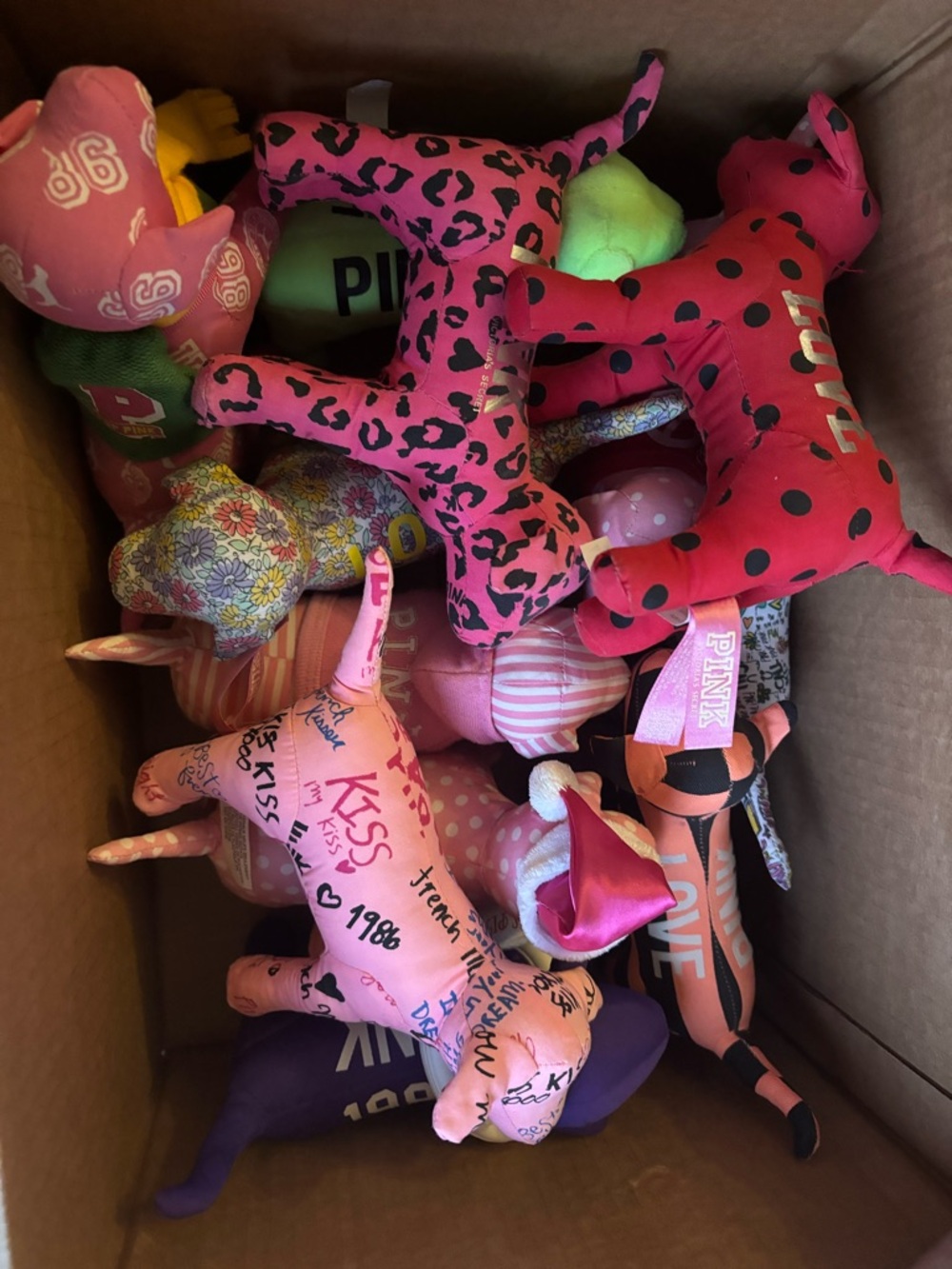 PINK Victoria's Secret Assorted Pink Patterned Plush Dog bundle. 12 total